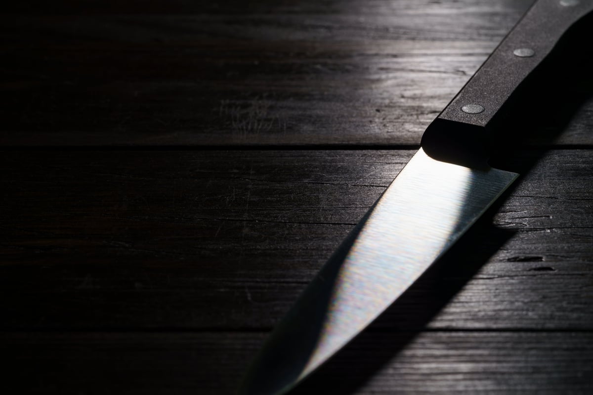 Kitchen knife on a dark background